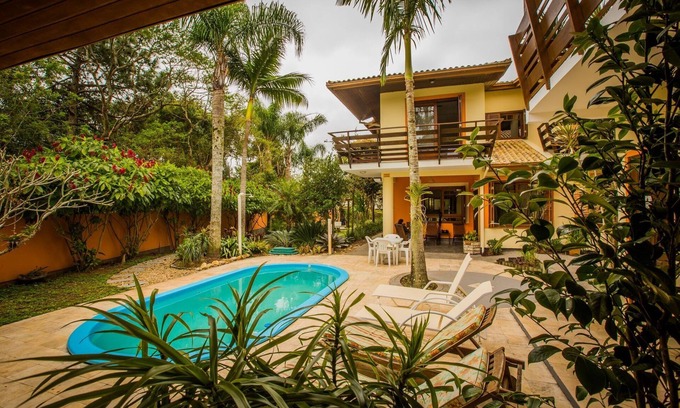 Campeche Norte House | Suíte Praia da Armação - Pousada Tulipane -Floripa