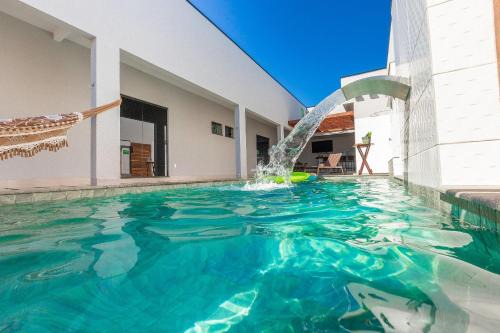 Setor Lagoa Quente House | Sua Casa Perfeita c/4 Suítes e Piscina Aquecida