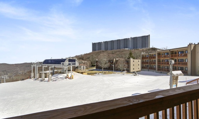 Sugar Mountain Condo | Sugar Ski Ski-In Ski-Out. 2 Bedroom. Pool+Hot tub. 150 feet from slope and pool.