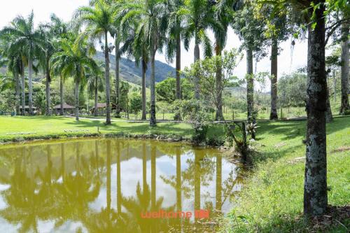 Macae Apartment | Suite em Macae com mini fazendinha e piscina