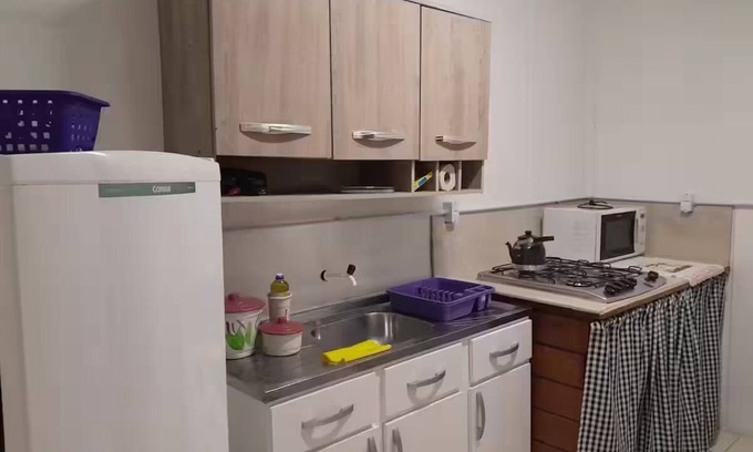 Cidade Nova Apartment | suite+kitchen twelve with air conditioning