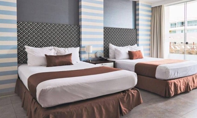 Asia Hotel | Suite Matrimonial King and living Room at VPX Hotel
