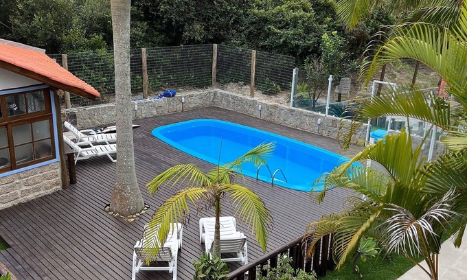 Garopaba House | Suite Térrea Premium - Pousada Buena Onda - SC