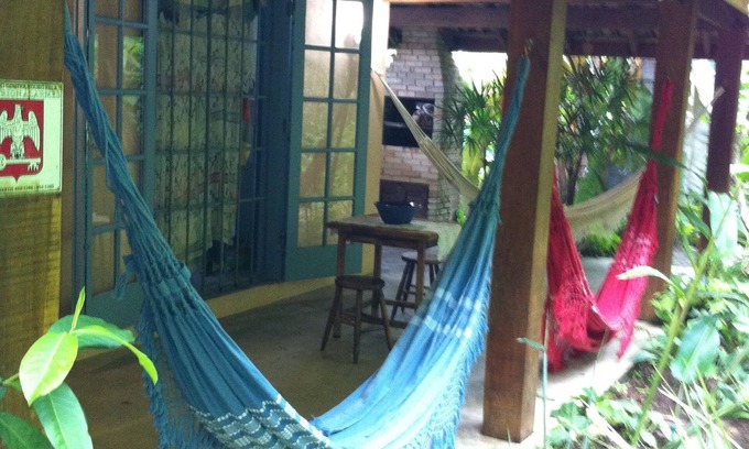 Praia do Pauba House | Summer and Winter - 100 m from the Beach - Large balcony and fireplace - 9 people.