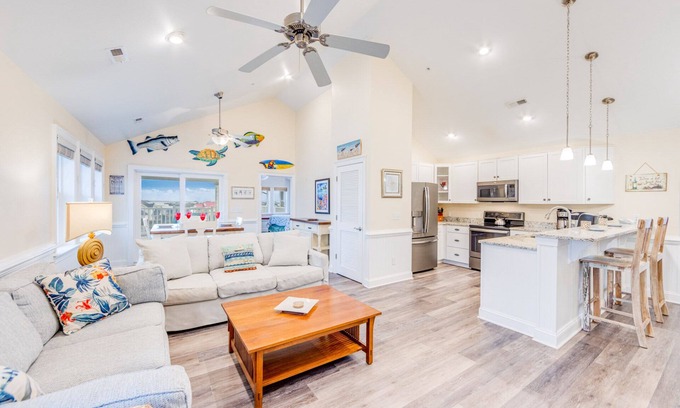 Hatteras Condo | SUMMER SAVINGS - Canalfront Condo w/Private Deck, Resort Pool, and Boat Slips