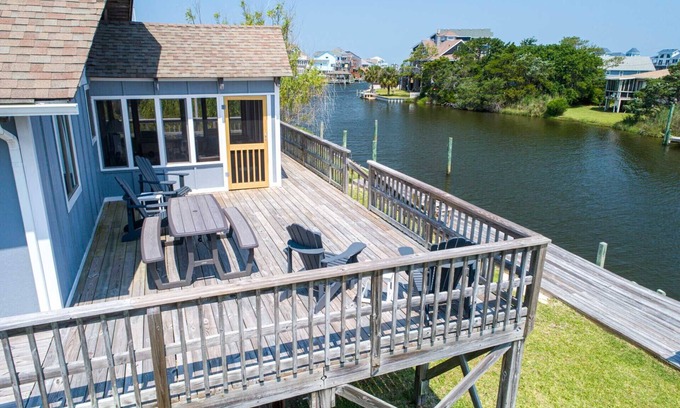Brigands' Bay House | SUMMER SAVINGS - Canalfront Home with Hot Tub, Private Boat Dock, and Smart TVs