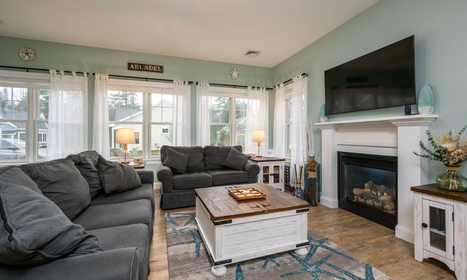 Arundel Cottage | Sunkissed cottage, resort amenities, heated pools, club house, close to beaches