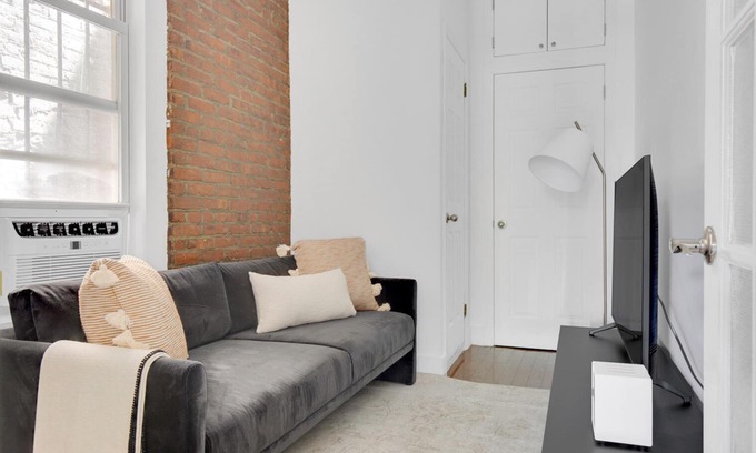 Chinatown Apartment | Sunlit LES 1BR w/W/D, steps to B/D train, by Blueground