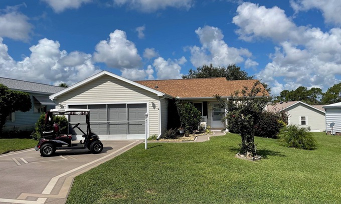 The Villages House | Sunlit retreat overlooking championship fairways—your Florida oasis awaits!