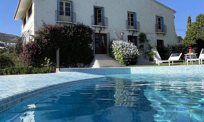Benalmadena Villa | Sunny family home w/andalusian courtyard, private pool & tennis. Pet-Friendly!