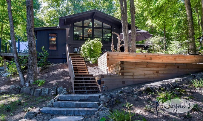 Seguin Cottage | Sunrises! Hot tub! Outdoor Kitchen! Spacious beach! Multiple outdoor fire pits!