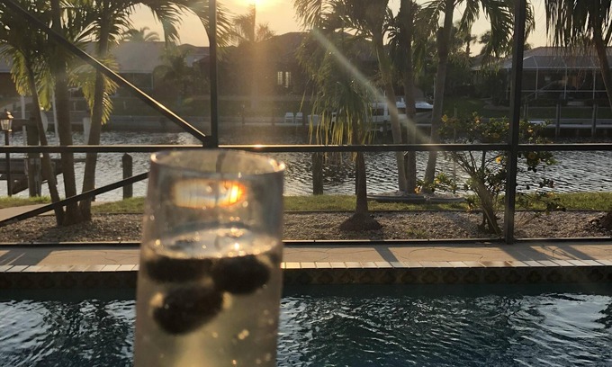Punta Gorda House | Sunset lit sky over private pool lanai! Walk 2 town & all around! PRIME LOCATION