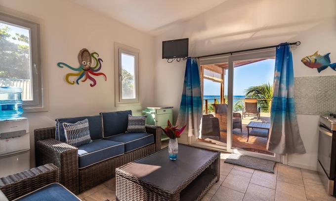 Sandy Bay Hotel | Sunset View Condo @ The Blue Bahia Resort in Sandy Bay