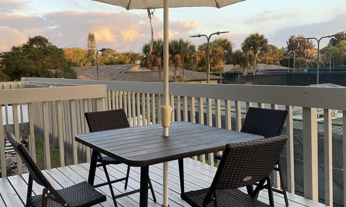 Florida Ridge Condo | Sunsets and Tennis Views! Totally remodeled condo with private deck
