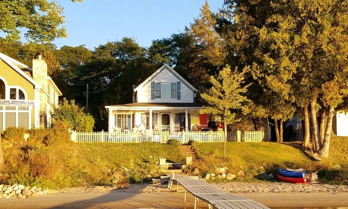 Alden Cottage | Sunsets & Private Sandy Beach Cottage on Torch Lake in Alden