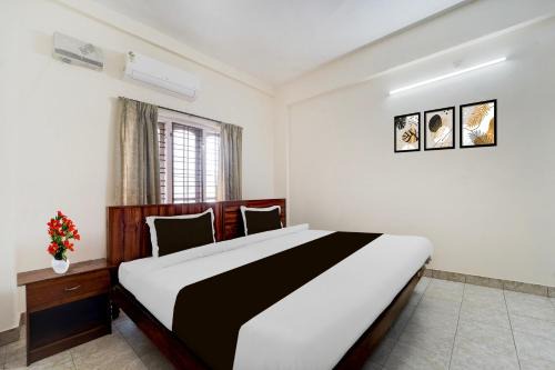 Kulanada Hotel | Super Hotel O Pathanamthitta Near Mahatma Gandhi Statue