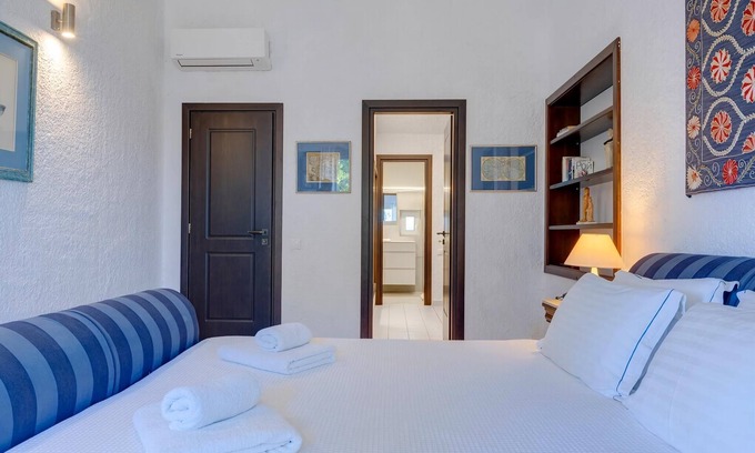 Achladies Villa | Super Luxury Skiathos Villa | Seven Stunning Bedroom Suites | Villa Daphne |.