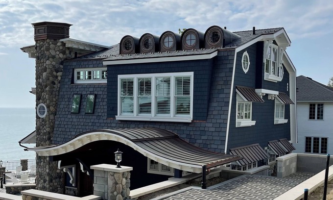 Macatawa House | Sweet Caroline . Lake MI Waterfront . Private Beach . Elevator . Sleeps 14