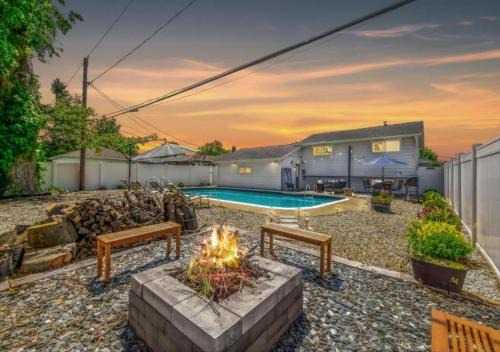 Parma House | Swim and Relax with a Pool Hot Tub and Renovated HomeHop