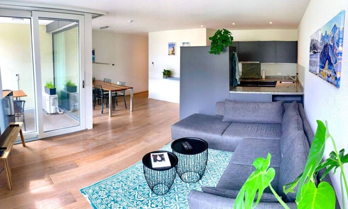 Unterseen Condo | SwissHut Modern 10min Interlaken West Station - Apart. Blume 1