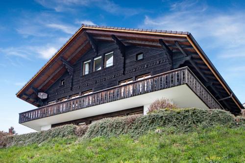 Aeschlen ob Gunten Ski Chalet | SwissHut Stunning Views Alps Lake - Chalet Antara