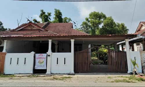 Kampung Sura House | Syah Homestay