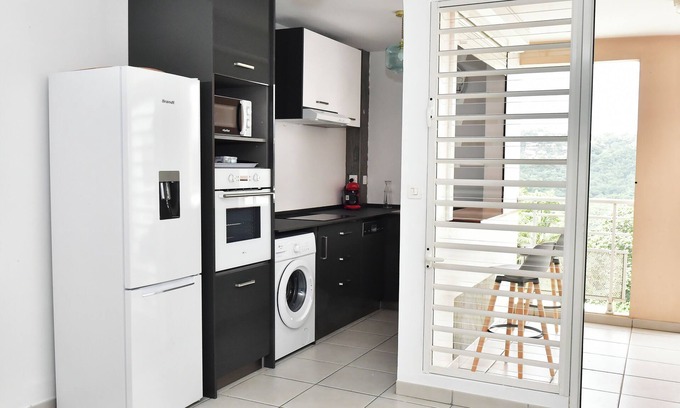 Fontaine de Moutte Apartment | T2 Furnished for Rent - Ideally located with view between Pitons & Sea