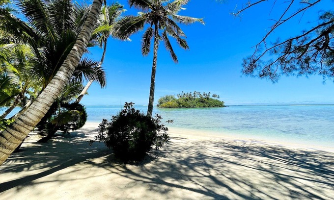 Muri House | Taakoka Muri Beach Villa - beach front, paddle boards, kayaks, pool, free WIFI !