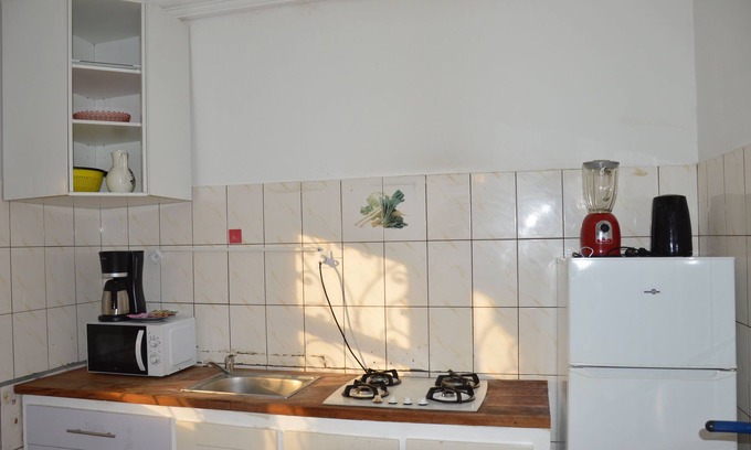 Kribi Apartment | Tahiti-Apartment-Family-Ensuite with Shower-Garden view