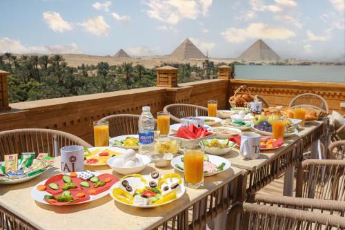 Kafrat al Jabal Bed & Breakfast | Taj Pyramids inn - Pyramids View Rooftop