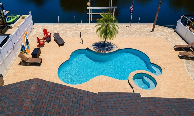 Tampa Shores Villa | Tampa Retreat: BBQ, Pool/Spa, Canal