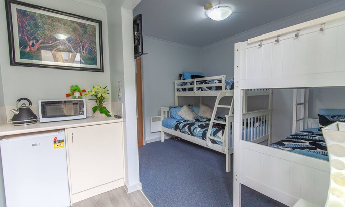 Baw Baw Village Cabin | Tanjil Creek Lodge - Bedroom 1 (modern, ensuited with kitchenette)
