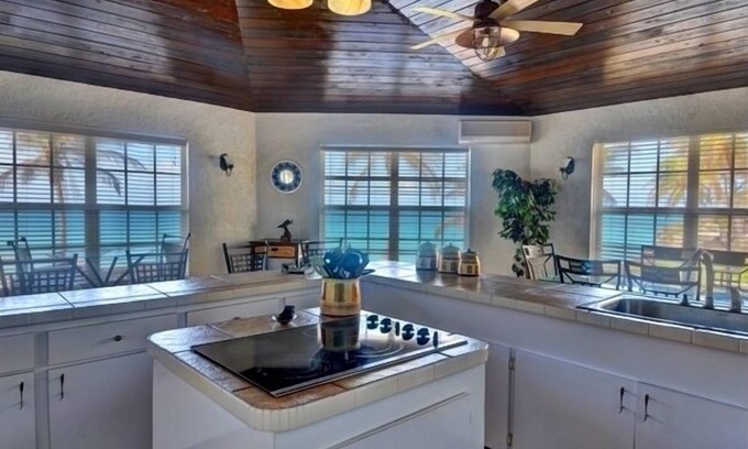 Gregory Town House | Tequila Sunset-Only Beach Front Home in Oleander Gardens