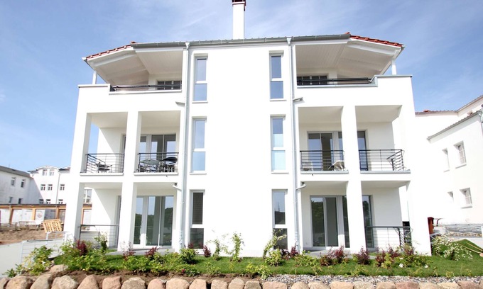 Gohren Apartment | Terrace, free use of the AHOI adventure pool and sauna - Villa Antje FeWo 04