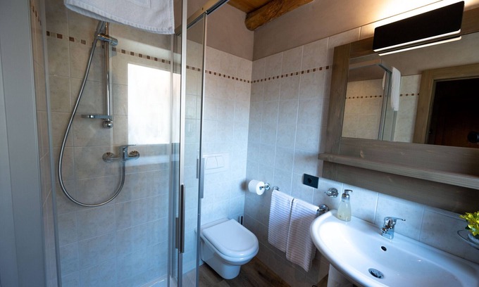 Chies d'Alpago Bed & Breakfast | TEVERONE SUITES & WELLNESS - Camera Gallo Forcello