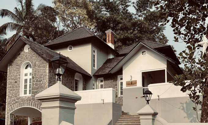 Vythiri House | "Thalimala Bungalow, Experience A Vintage Colonial Charm in a Tea-Scaped Haven"