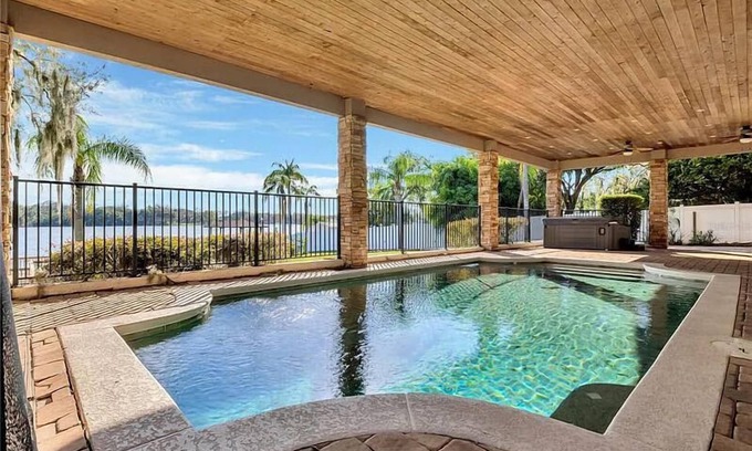 Longwood House | The American Dream House – Lakefront Luxury with 2 Heated Pools & Hot Tub