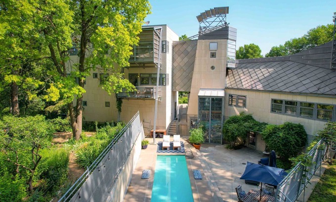 Lawrence House | The Architect’s Modern Castle with Heated Pool and Expansive Private Patio