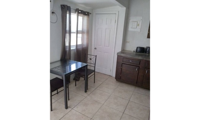 Alice Town House | The beach is our back yard apt #1A