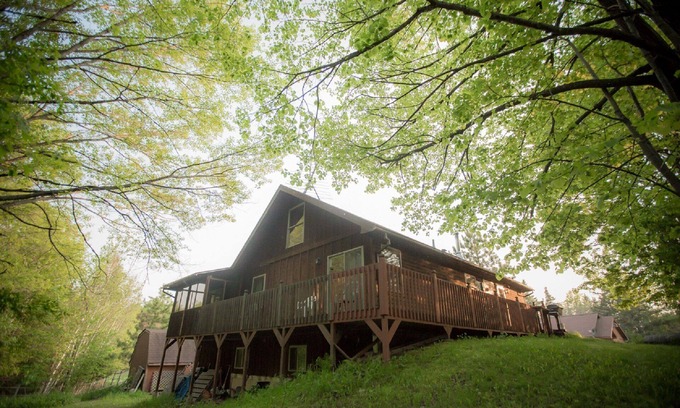 Finlayson House | The Cedar House Is Uniquely Set In The Forest Surrounded By Decks And Porches.