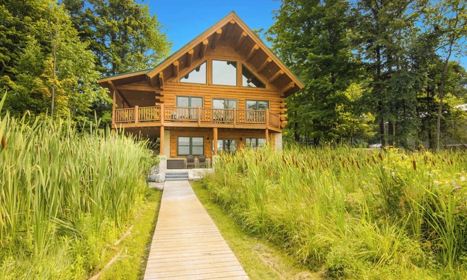 Bellaire House | THE CLAM SHELL Log Home on Clam Lake