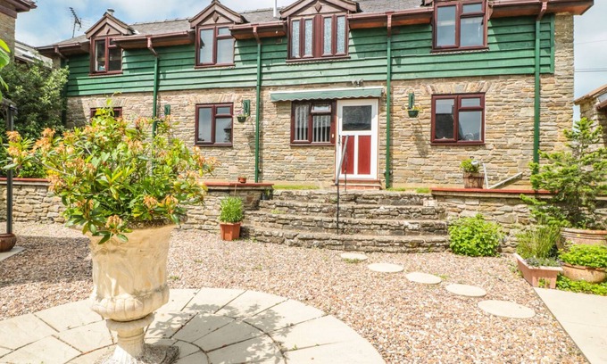 Kington House | THE COURTYARD, with a garden in Gladestry