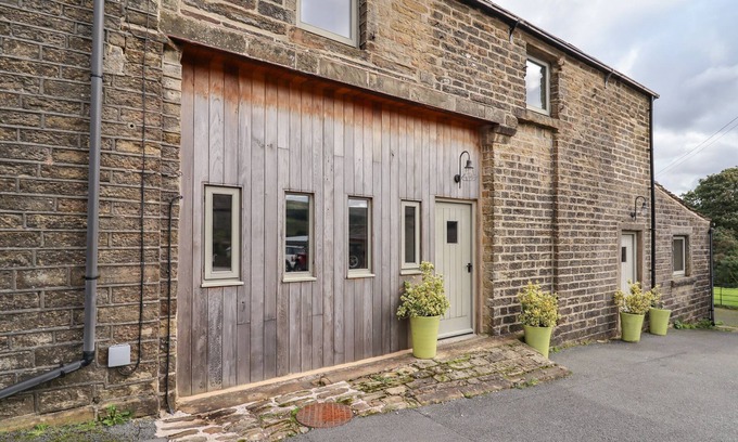 Holmfirth Cottage | THE COW SHED, with open fire in Holme, Yorkshire