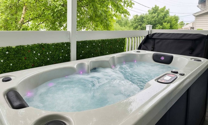 Quartier 5-4 Apartment | The Coziest | Hot Tub | EV Charger & Free Parking
