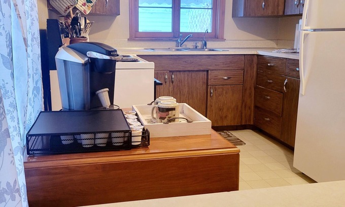 Terry House | The Cozy Cottage is nestled in a charming neighborhood for the perfect get-away.