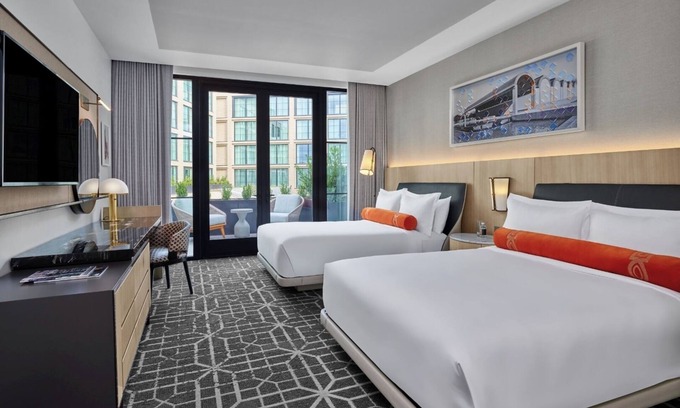 Fort Worth Cultural District Hotel | The Crescent Hotel | Patio Deluxe Queen Queen | Walk to National Cowgirl Museum