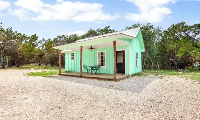 Driftwood Cabin | The Driftwoods - Charming Green Cabin with Fun Entertainment Area