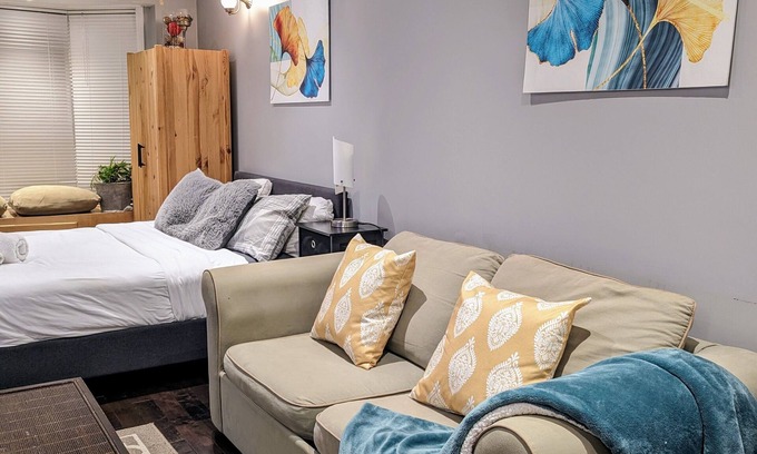 St. Vital Apartment | The EthlynGwen- Main Floor with Private entrance and Hot tub