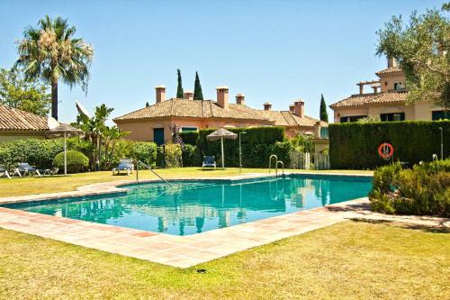 Sotogrande Villa | The Fairway Vista, Your Luxury Retreat with a Quiet Pool