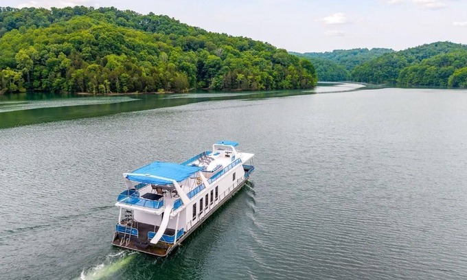 Allons Boat Rental | The Flagship Houseboat 84' - Largest Houseboat, 6 bedrooms,waterslide, fireplace on rooftop lounge area